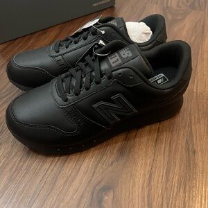 New Balance 311 women’s size 7 WIDE.